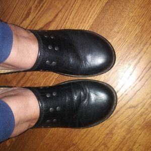 High heeled, black leather mules